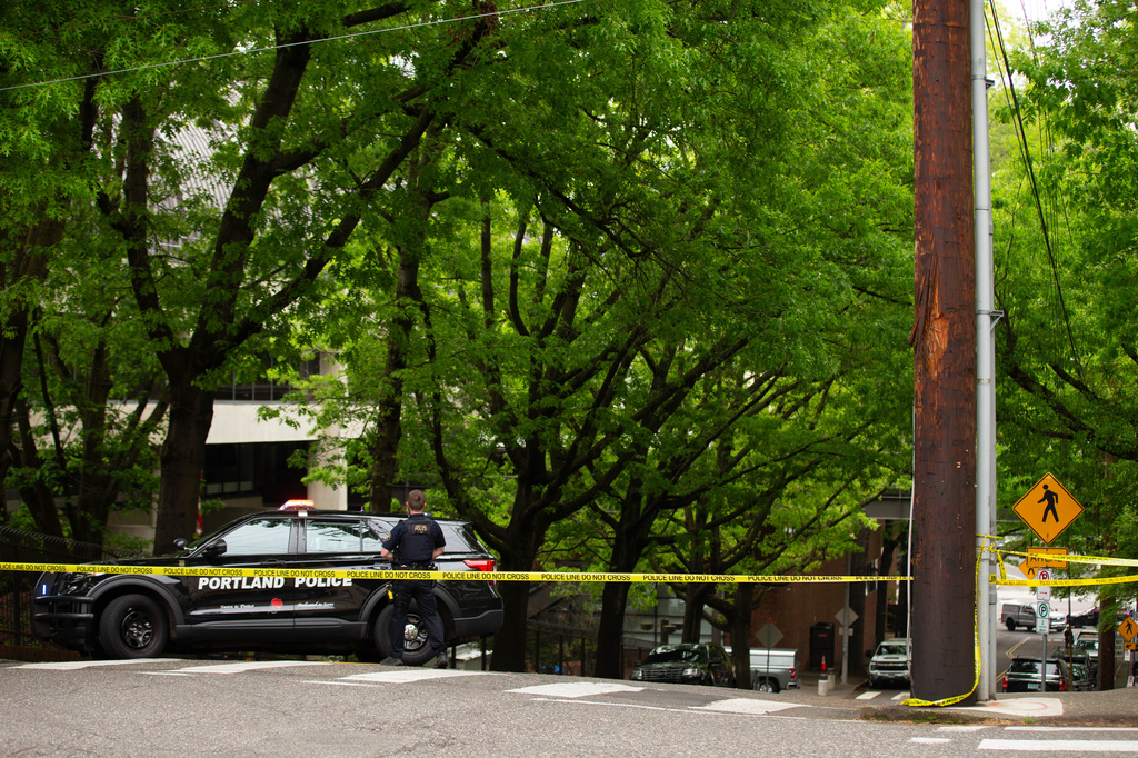 Police shut down the block surrounding the Multnomah Athletic Club in Northwest Portland, Ore., on Saturday, May 2, 2026. (Allison Barr/The Oregonian via AP)
