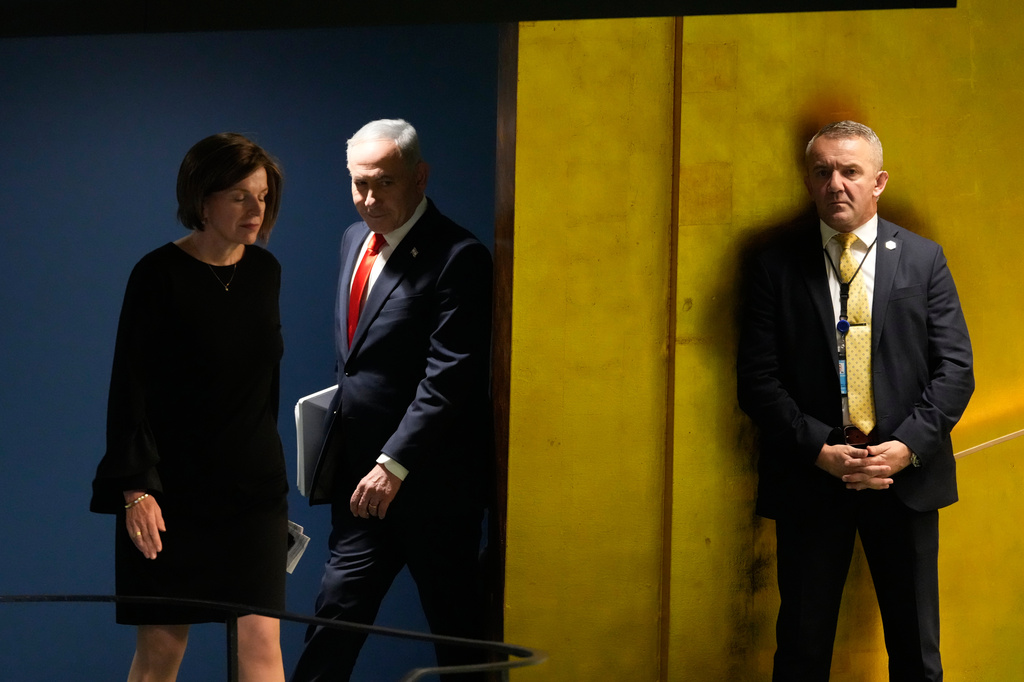 Israeli Prime Minister Benjamin Netanyahu, center, enters to speak during the 81st session of the United Nations General Assembly at United Nations headquarters, Thursday, Sept. 24, 2026. (AP Photo/Seth Wenig)