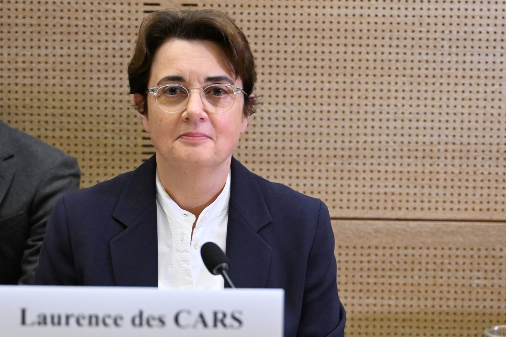Laurence des Cars, director of Le Louvre museum, poses before a hearing at the Culture commission of the Senate, three days after historic jewels were stolen in a daring daylight heist, Wednesday, Oct. 22, 2025 in Paris. (AP Photo/Emma Da Silva)