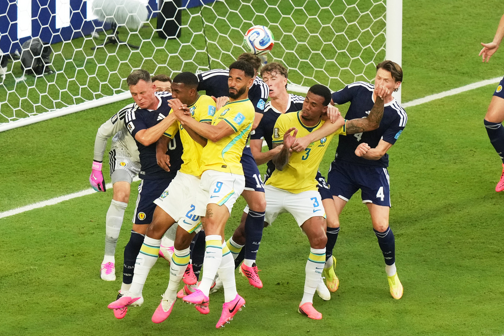 Brazil's Matheus Cunha (9) heads the ball during the World Cup Group C soccer match against Scotland in Miami Gardens, Fla., Wednesday, June 24, 2026. (AP Photo/Marta Lavandier)