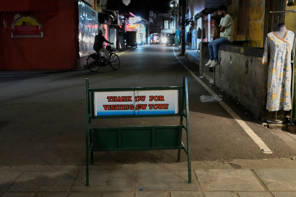 An iron stand with a message at the entrance to the historic Jew Town neighborhood of Kochi, India, Wednesday, May 20, 2026. (AP Photo/Aijaz Rahi)