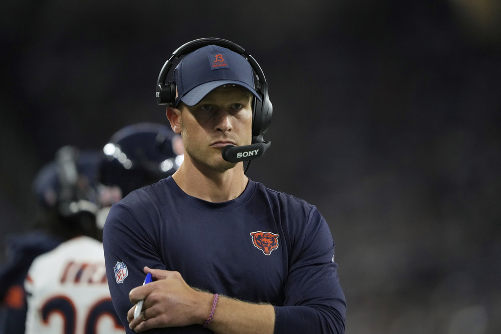 Chicago Bears head coach Ben Johnson watches from the sidelines during the first half of an NFL football game against the Detroit Lions in Detroit, Sunday, Sept. 14, 2025. (AP Photo/Ryan Sun)
