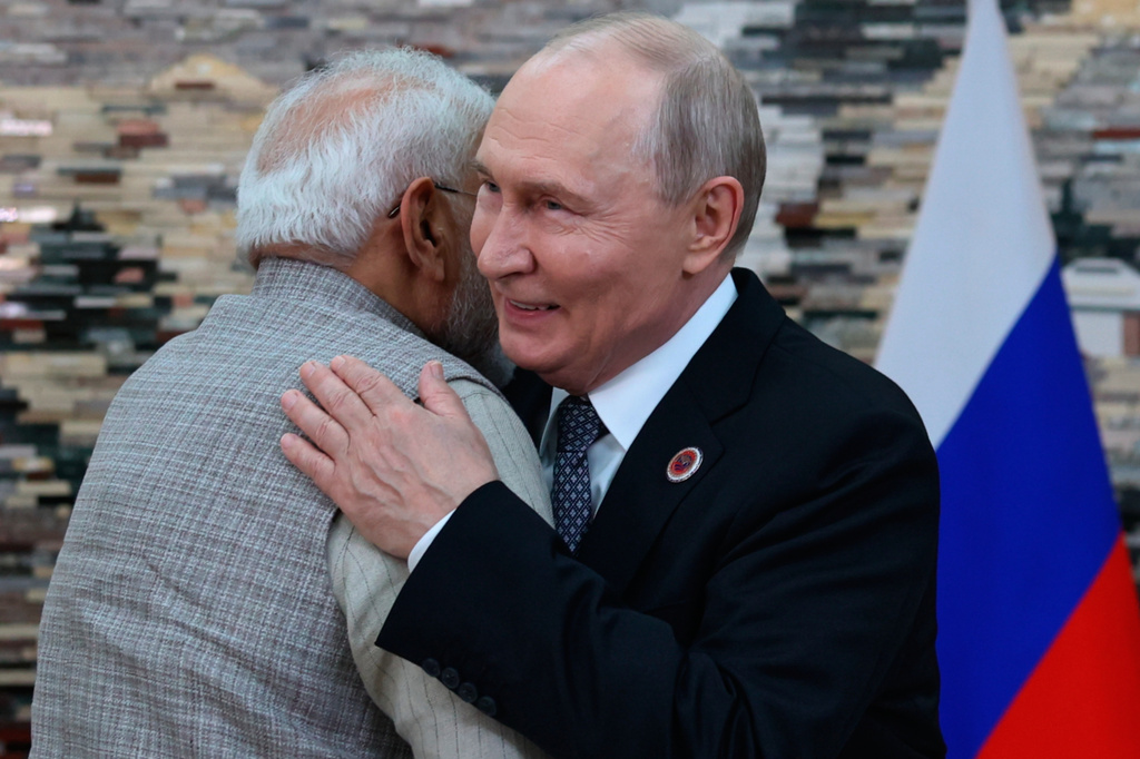 Russian President Vladimir Putin, right, and Indian Prime Minister Narendra Modi embrace each other during their meeting on the sidelines of the Shanghai Cooperation Organization (SCO), in Bishkek, Kyrgyzstan, on Monday, Aug. 31, 2026. (Pyotr Kovalev, Sputnik, Kremlin Pool Photo via AP)