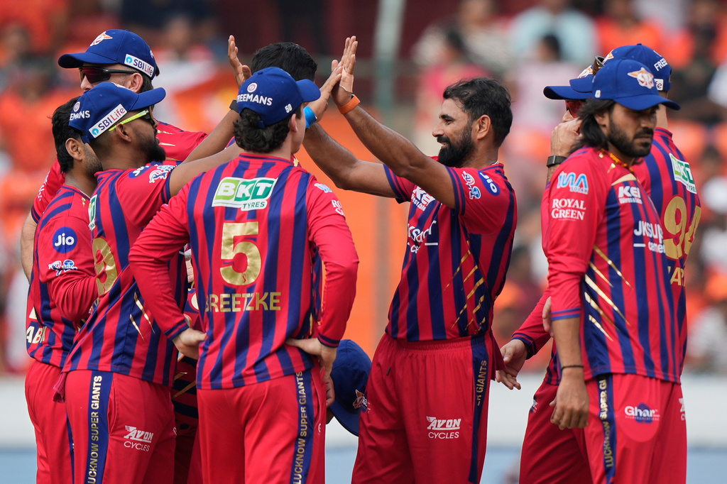 Lucknow Super Giants' Mohammed Shami, centre, celebrates with teammates the wicket of Sunrisers Hyderabad's Travis Head during the Indian Premier League cricket match between Sunrisers Hyderabad and Lucknow Super Giants in Hyderabad, India, Sunday, April 5, 2026. (AP Photo/Mahesh Kumar A.)