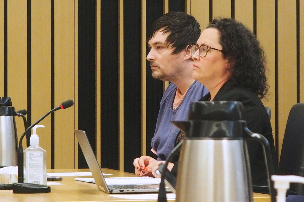 Jesse Calhoun, left, sits in court Wednesday, June 3, 2026, in Portland, Ore., as he is arraigned on a second-degree murder charge over the death of Ashley Real. (Isabel Funk/The Oregonian via AP, Pool)