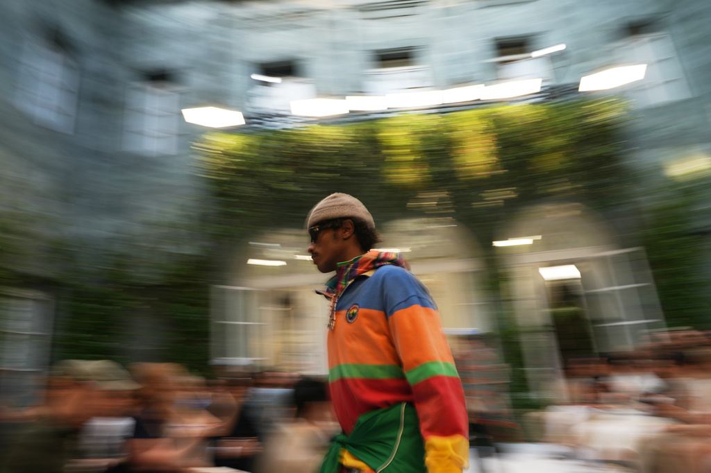 A model wears a creation as part of the Ralph Lauren Spring/Summer 2027 men's collection presented in Milan, Italy, Friday, June 19, 2026. (AP Photo/Antonio Calanni)