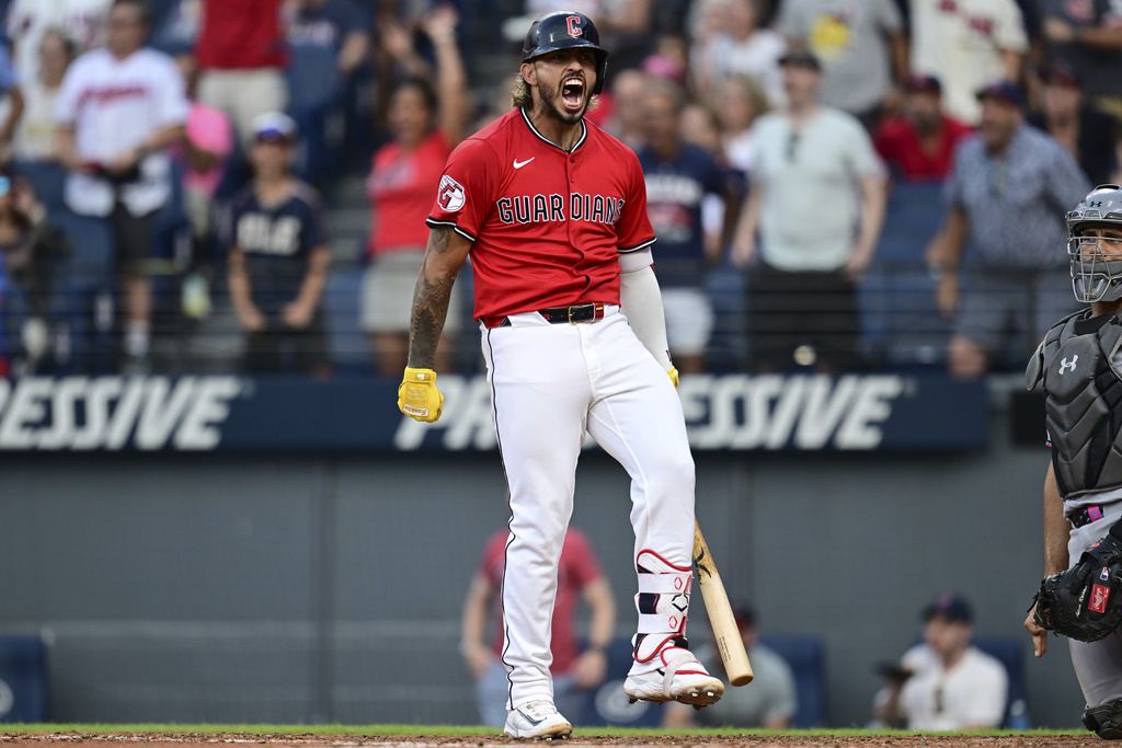 Cleveland Guardians' Gabriel Arias reacts after hitting a three-run home run off Miami Marlins starting pitcher Eury Pérez during the fourth inning of a baseball game, Wednesday, Aug. 13, 2025, in Cleveland. (AP Photo/David Dermer)
