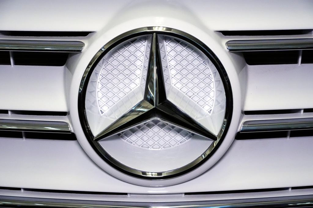 FILE - A Mercedes Benz logo is displayed on a vehicle at the Pittsburgh International Auto Show in Pittsburgh, Feb. 14, 2025. (AP Photo/Gene J. Puskar, File)
