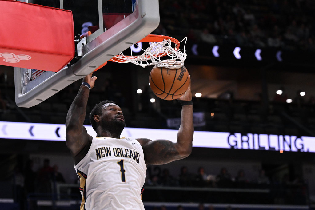 New Orleans Pelicans forward Zion Williamson dunks during the first half of an NBA basketball game against the Dallas Mavericks in New Orleans, Monday, March 16, 2026. (AP Photo/Ella Hall)