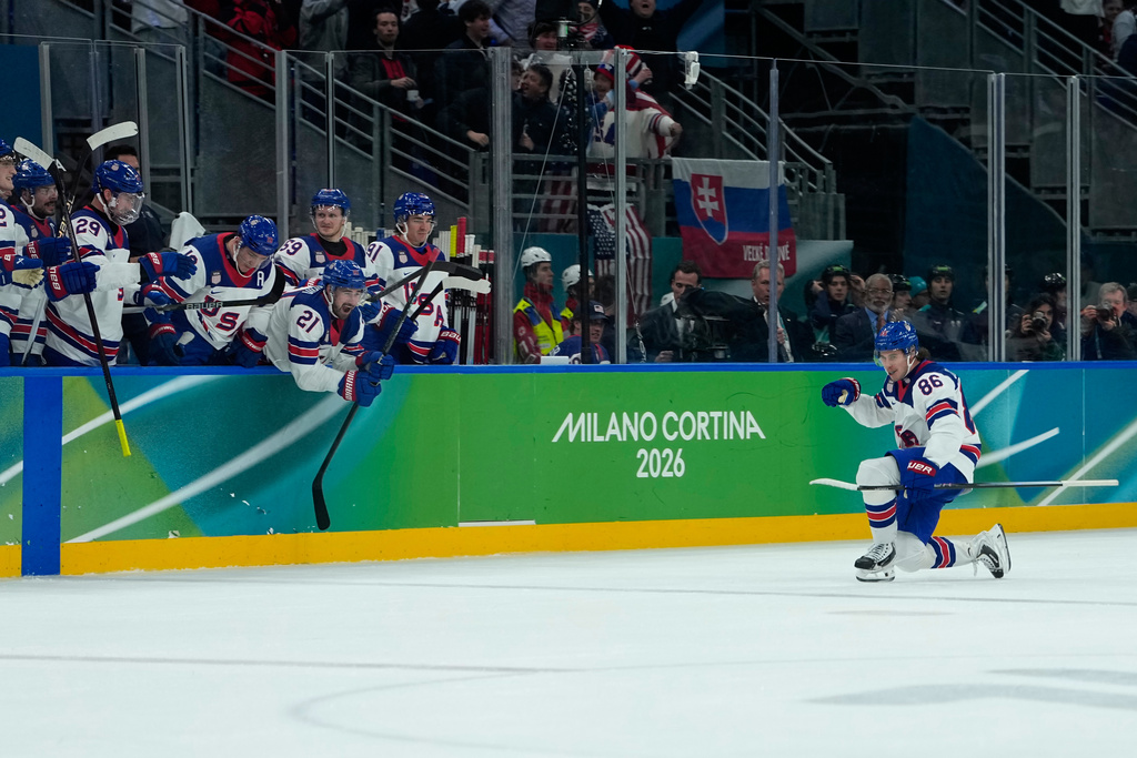United States' Jack Hughes (86) celebrates after scoring his side's third goal during a men's ice hockey semifinal game between United States and Slovakia at the 2026 Winter Olympics, in Milan, Italy, Friday, Feb. 20, 2026. (AP Photo/Petr David Josek)