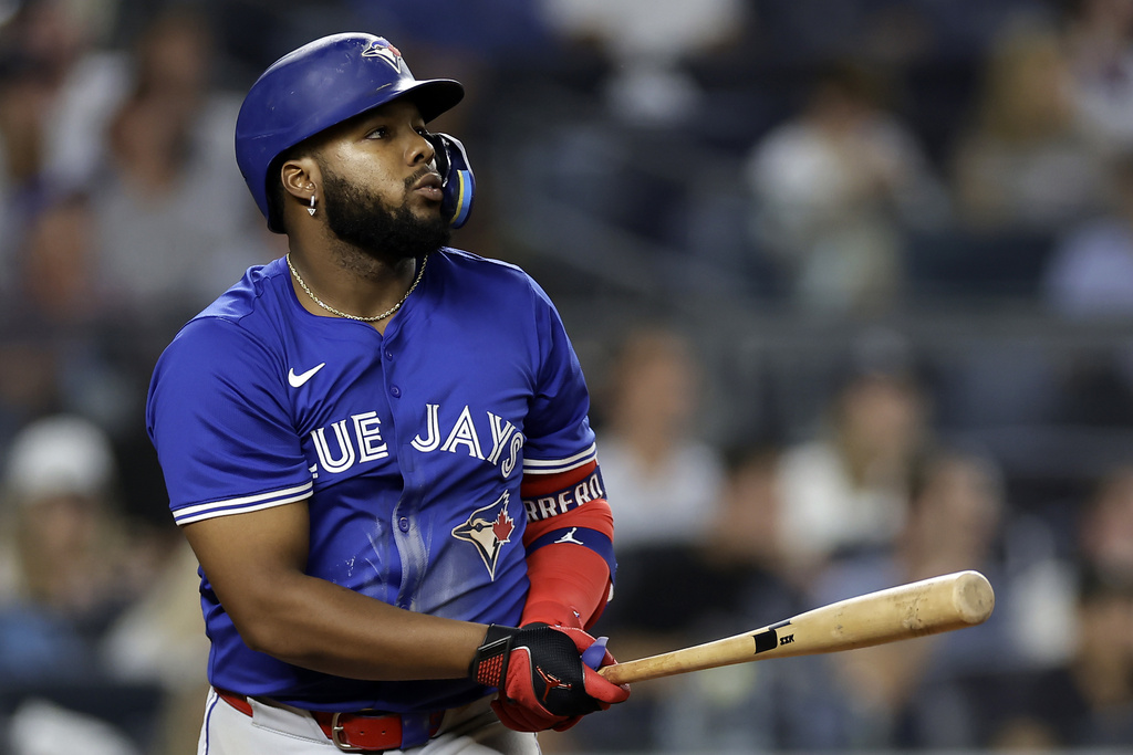 Toronto Blue Jays' Vladimir Guerrero Jr. watches his home run during the fifth inning of a baseball game against the New York Yankees, Friday, Sept. 5, 2025, in New York. (AP Photo/Adam Hunger)