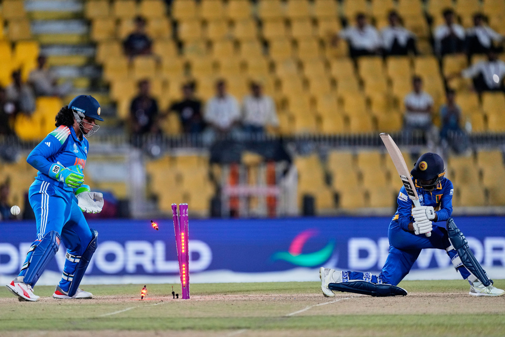 Sri Lanka's Sugandika Kumari bowled by India's Sneh Rana during the ICC Women's Cricket World Cup match between India and Sri Lanka at Barsapara Cricket Stadium in Guwahati, India, Tuesday, Sept. 30, 2025. (AP Photo/Anupam Nath)