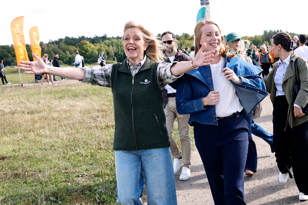Sweden's Center Party leader Elisabeth Thand Ringqvist, left, campaigns with former party leader Annie Lööf in Stockholm, Sweden, Saturday Sept. 5, 2026, ahead of the general election on Sept. 13. (Stefan Jerrevång/TT via AP)