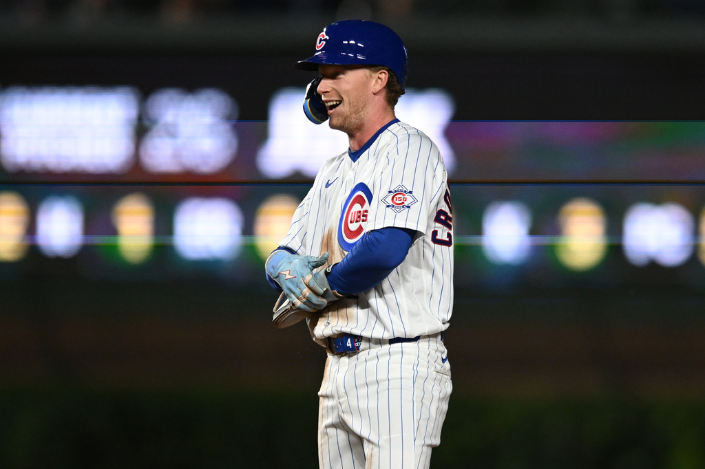 Chicago Cubs' Pete Crow-Armstrong celebrates after stealing second base during the third inning of a baseball game against the Miami Marlins Tuesday, Sept. 22, 2026, in Chicago. (AP Photo/Paul Beaty)