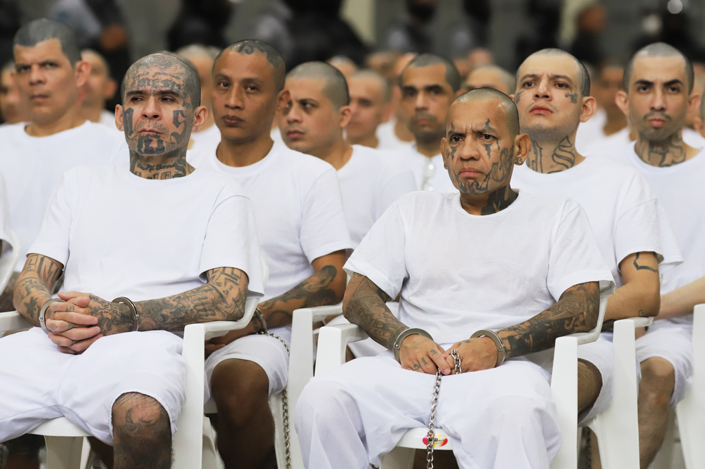 FILE - Alleged gang members take part in a mass trial at the Terrorism Confinement Center (CECOT) in Tecoluca, El Salvador, April 23, 2026. (AP Photo/Salvador Melendez, File)