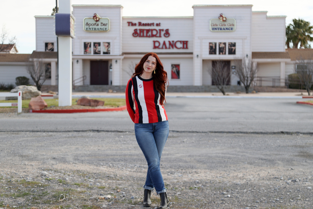 A sex worker, who goes by the name Molly Wilder, poses for a photo in front of Sheri's Ranch, a brothel In Pahrump, Nev. on Thursday, Feb. 12, 2026. (AP Photo/Ian Maule)