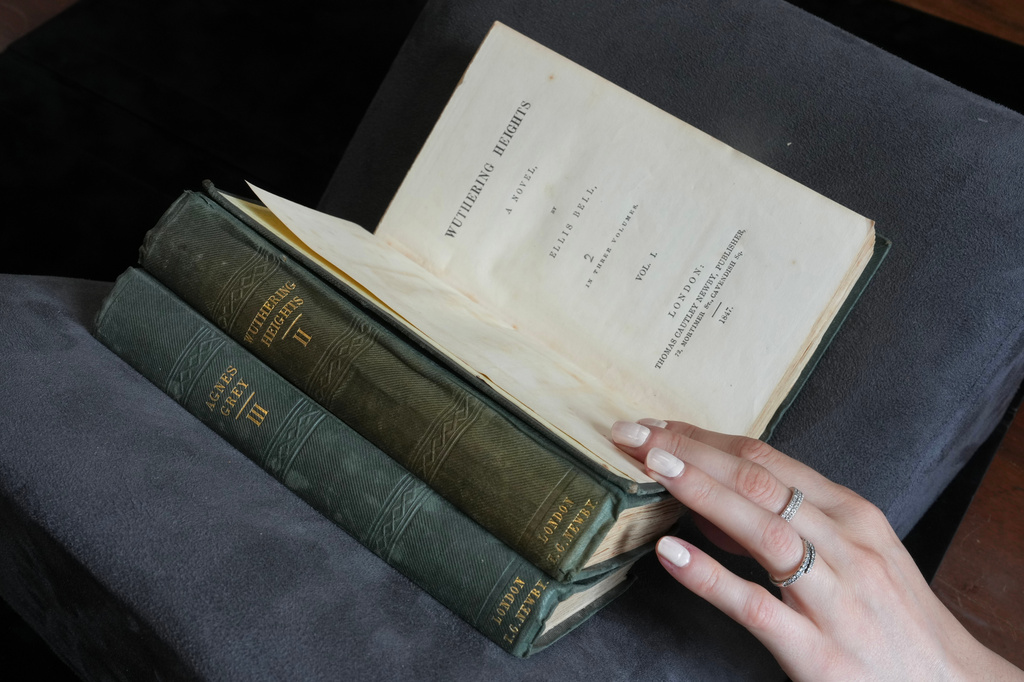 A first edition of Emily Bronte's Wuthering Heights, is on display for sale at Christie's auction house, with copies estimated at 400,000–600,000 GBP (540,000–810,000 USD) in London, Monday, June 15, 2026. (AP Photo/Kin Cheung)