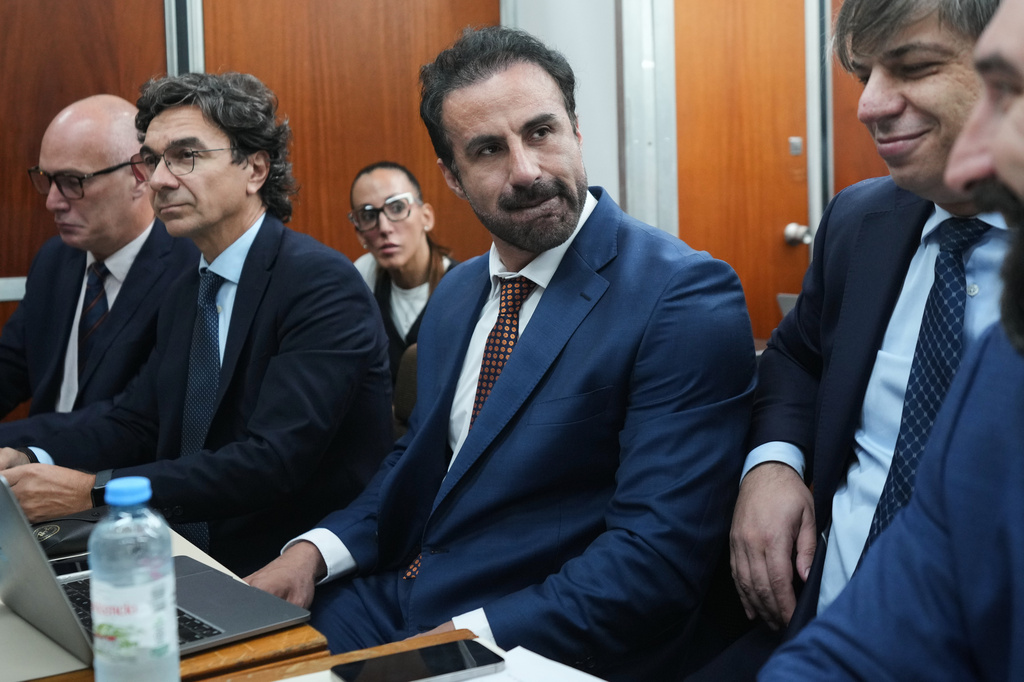 Physician Leopoldo Luque sits in court for the first day of his trial with the medical team that treated the late soccer star Diego Maradona, to face charges of alleged homicide by negligence in San Isidro, Argentina, Tuesday, April 14, 2026. (AP Photo/Rodrigo Abd)