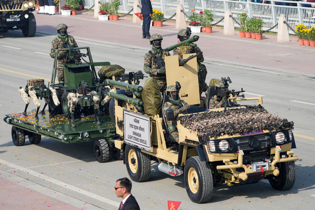 Indian Army soldiers on light strike vehicles drive past during the Republic Day parade celebrations in New Delhi, India, Monday, Jan. 26, 2026. (AP Photo/Manish Swarup)