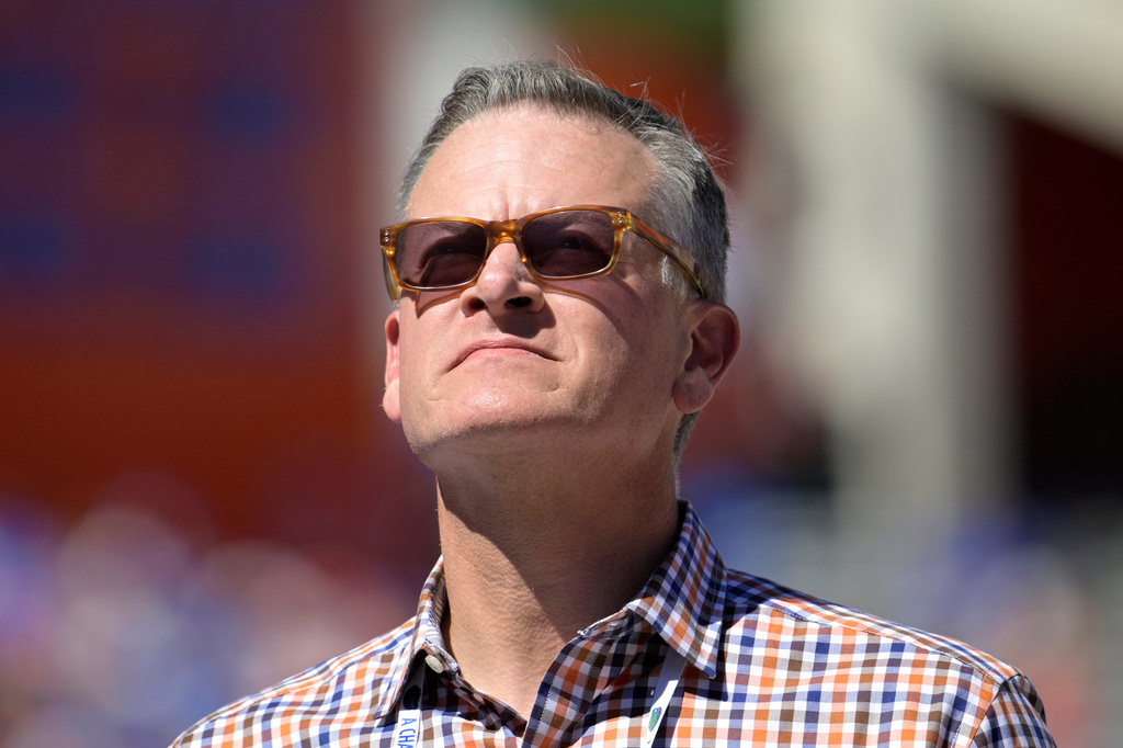 FILE - Florida athletic director Scott Stricklin looks to the stands during the second half of an NCAA college football game against Eastern Washington, Oct. 2, 2022, in Gainesville, Fla. (AP Photo/Phelan M. Ebenhack, File)