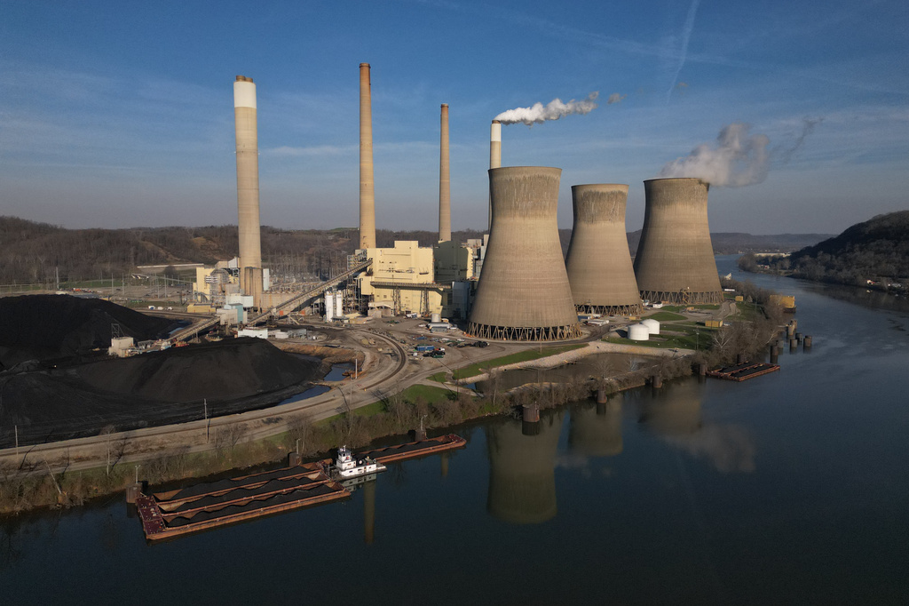 American Electric Power's John Amos coal-fired power plant in Winfield, W.Va., stands across the Kanawha River, Sunday, March 22, 2026. (AP Photo/Carolyn Kaster)