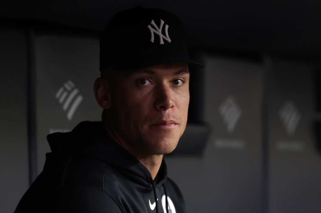 New York Yankees right fielder Aaron Judge (99) looks on from the dugout during the seventh inning of a baseball game against the Cleveland Guardians, Tuesday, June 2, 2026, in New York. (AP Photo/Adam Hunger)