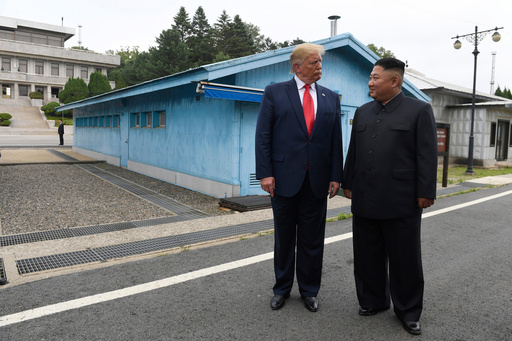 FILE - In this June 30, 2019, file photo, U.S. President Donald Trump, left, meets with North Korean leader Kim Jong Un at the border village of Panmunjom in Demilitarized Zone, South Korea. North Korea on Tuesday, Nov. 5, 2019, said the U.S. redesignation of Pyongyang as a sponsor of terrorism is dimming prospects for nuclear diplomacy between the countries. (AP Photo/Susan Walsh, File) FILE - In this June 30, 2019, file photo, U.S. President Donald Trump, left, meets with North Korean leader Kim Jong Un at the border village of Panmunjom in Demilitarized Zone, South Korea. North Korea on Tuesday, Nov. 5, 2019, said the U.S. redesignation of Pyongyang as a sponsor of terrorism is dimming prospects for nuclear diplomacy between the countries. (AP Photo/Susan Walsh, File)