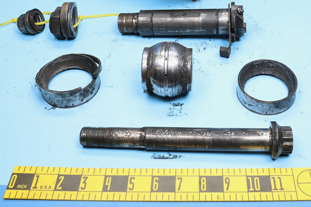 This photo released by the National Transportation Safety Board (NTSB) on Nov. 20, 2025, shows the spherical bearing and other pieces of the damaged mount of the engine that flew off a UPS cargo plane in Louisville, Ky., on Nov. 4, 2025. (National Transportation Safety Board via AP)