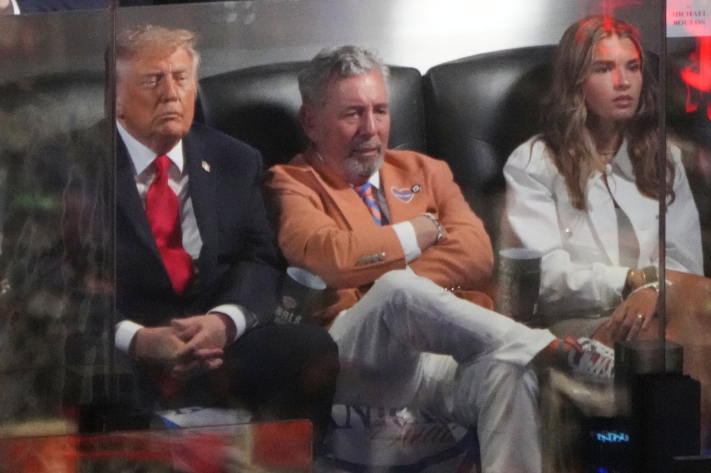 President Donald Trump watches Game 3 of the NBA Finals basketball series between the New York Knicks and the San Antonio Spurs at Madison Square Garden in New York, Monday, June 8, 2026, with Knicks owner James Dolan and Kai Trump. (AP Photo/Mark Schiefelbein)