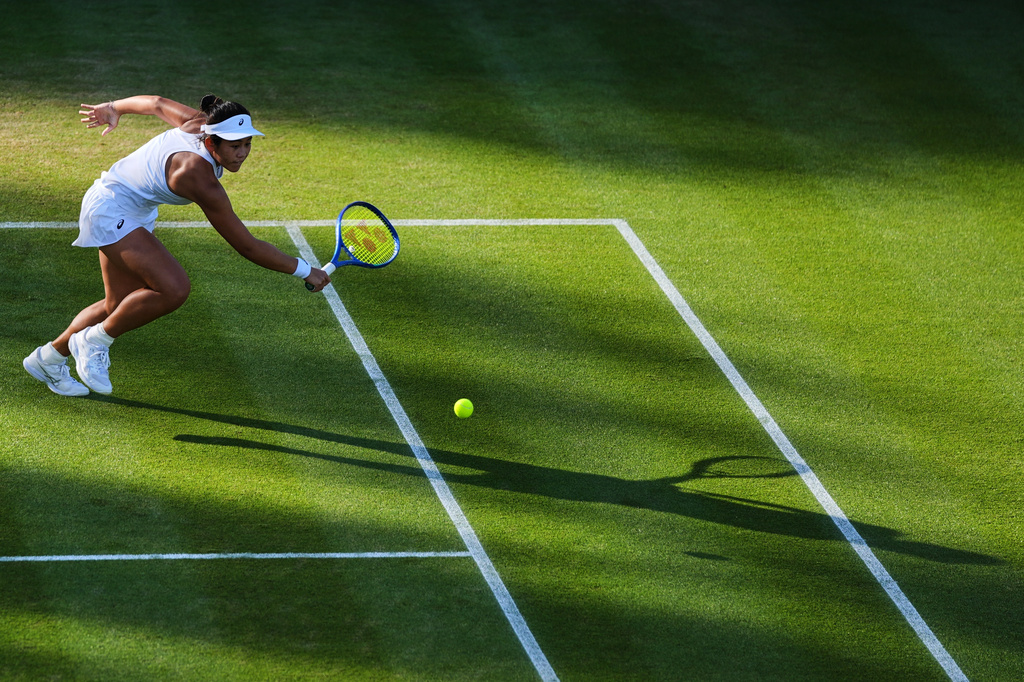 Lanlana Tararudee of Thailand runs for the ball during the second round women's singles match against Ekaterina Alexandrova of Russia at the Wimbledon Tennis Championships in London, Wednesday, July 1, 2026.(AP Photo/Maja Smiejkowska)