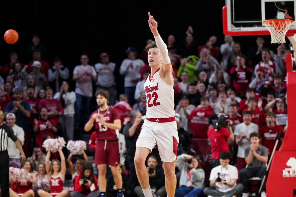Miami (Ohio) forward Brant Byers (22) reacts after scoring during the first half of an NCAA college basketball game against UMass, Tuesday, Jan. 27, 2026, in Oxford, Ohio. (AP Photo/Jeff Dean)