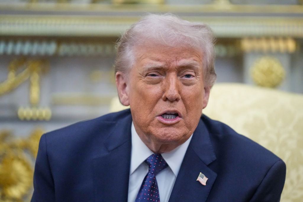 President Donald Trump speaks during a meeting with German Chancellor Friedrich Merz in the Oval Office at the White House, Tuesday, March 3, 2026, in Washington. (AP Photo/Mark Schiefelbein)
