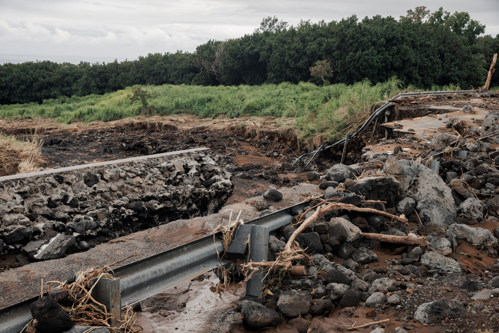 A section of Hawaii Belt Road damaged by Hurricane Lala is seen in Pahala, Hawaii, Monday, Aug. 17, 2026. (Stephen Lam/San Francisco Chronicle via AP)