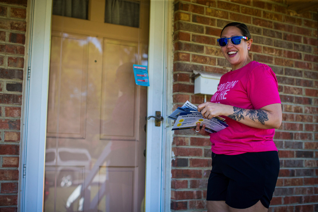 Rae Pickett, who is Communication Director for Planned Parenthood Advocates of Virginia, campaigns for Abigail Spanberger in the governor's race, Oct. 19, 2025 in Petersburg, Va. (AP Photo/John Clark)