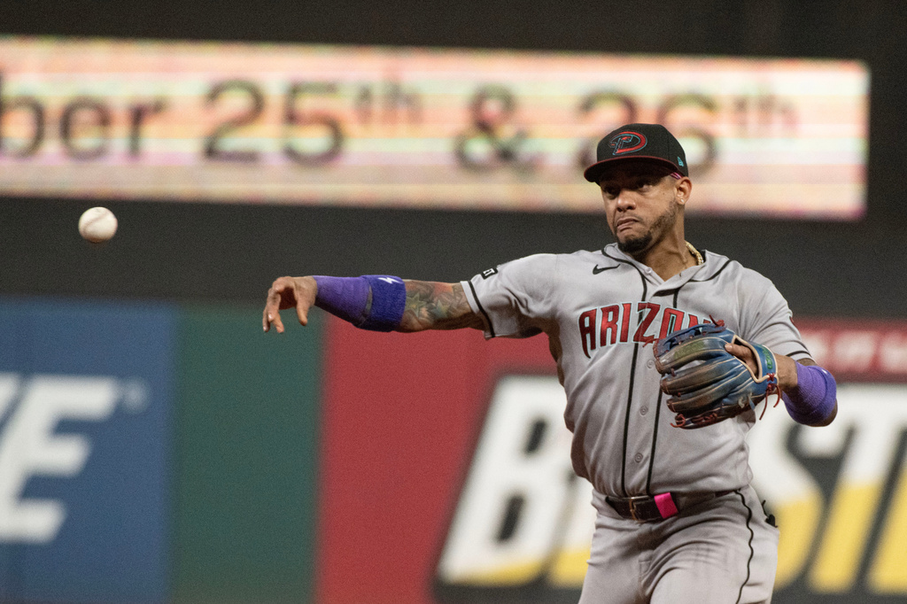 Arizona Diamondbacks' Ketel Marte throws out Cleveland Guardians' Travis Bazzana during the sixth inning of a baseball game, Saturday, Aug. 1, 2026, in Cleveland. (AP Photo/Phil Long)