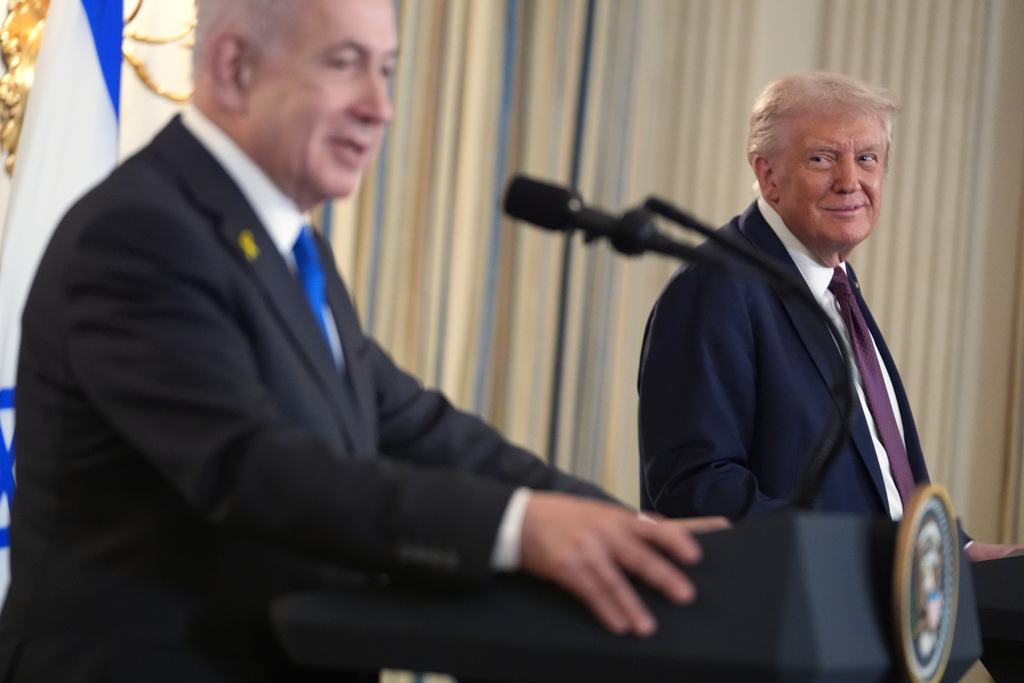 President Donald Trump listens during a news conference with Israeli Prime Minister Benjamin Netanyahu in the State Dining Room of the White House, Monday, Sept. 29, 2025, in Washington. (AP Photo/Evan Vucci)