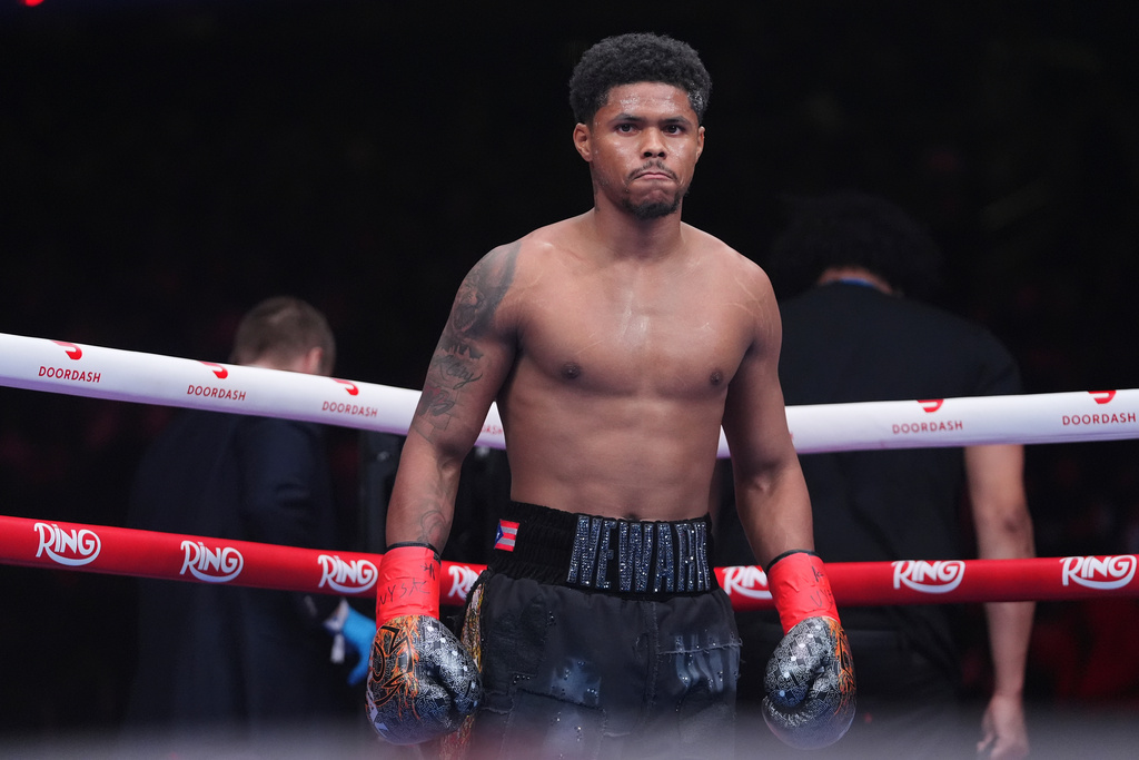 CORRECTS THE NAME TO SHAKUR, NOT SHADUR - Shakur Stevenson waits for the start of a super lightweight title boxing match against Teofimo Lopez Sunday, Feb. 1, 2026, in New York. (AP Photo/Frank Franklin II)