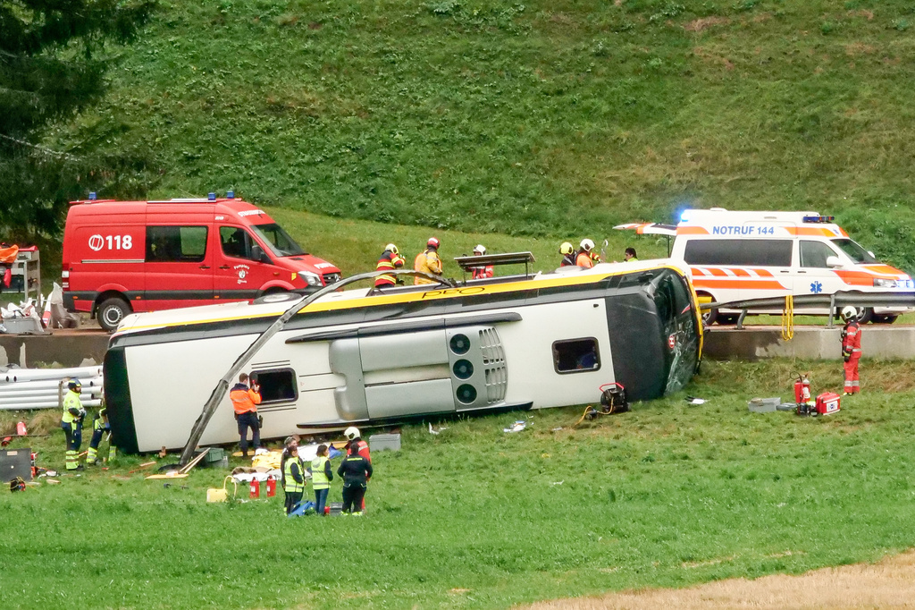 Emergency personnel respond to an accident involving a tour bus near Susch, in the canton of Grisons, Switzerland, on Thursday, Sept. 10, 2026. (Jon Duschletta/Engadiner Post/Keystone via AP)