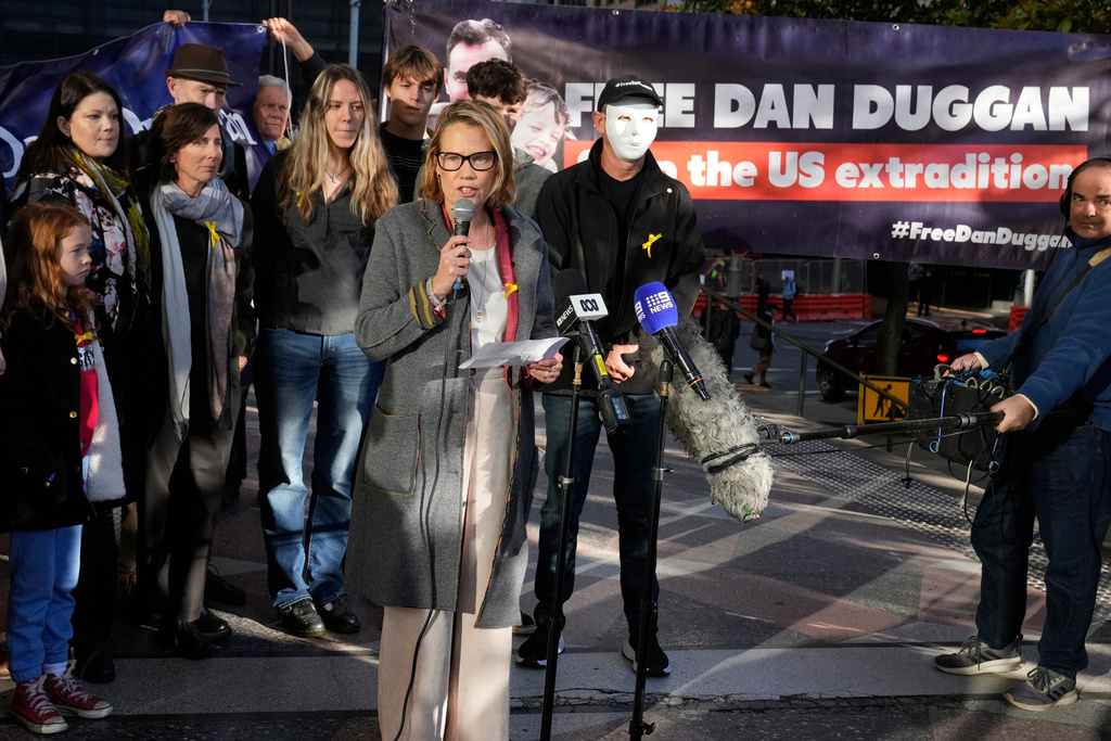 FILE -Saffrine Duggan speaks outside Downing Central Court in Sydney, May 24, 2024, where her husband Daniel was scheduled to appear. (AP Photo/Rick Rycroft, File)