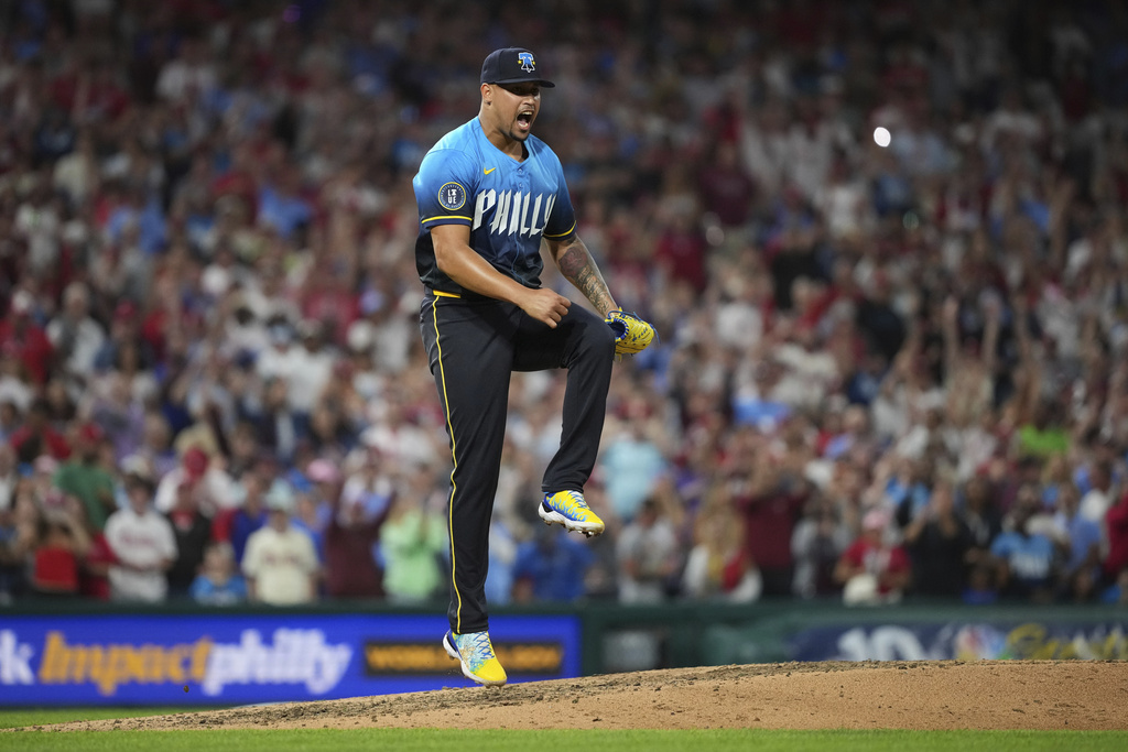 Philadelphia Phillies pitcher Jhoan Duran reacts after the Phillies won a baseball game against the Atlanta Braves Friday, Aug. 29, 2025, in Philadelphia. (AP Photo/Matt Slocum)