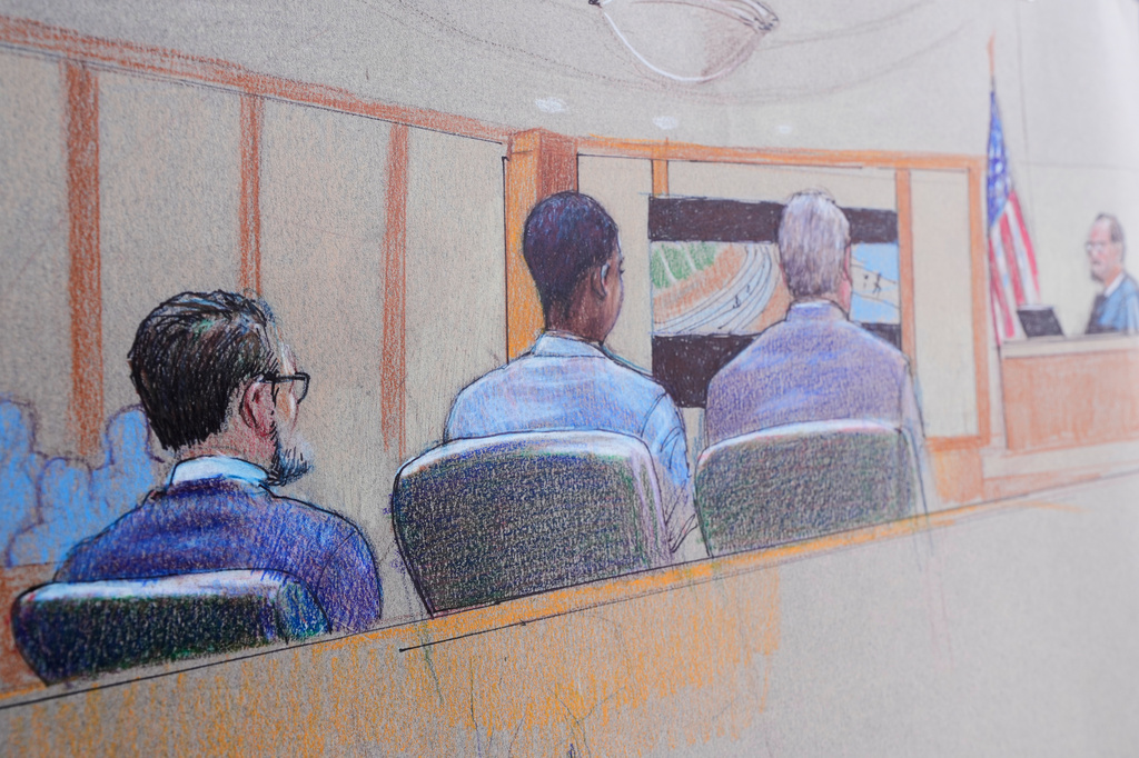 A courtroom sketch, provided by Pat Lopez shows Karmelo Anthony, center, at the defense table, the jury on the left and the presiding judge on the right, on Thursday, June 4, 2026, in McKinney, Texas, during the trial of a teen accused of fatally stabbing another during a track meet in suburban Dallas last year. (Pat Lopez via AP)