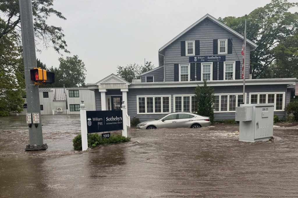 This photo provided by Westport Fire Department shows flash flooding in Westport, Conn., Sunday, Sept. 13, 2026. (Jennifer Petrosinelli/Westport Fire Department via AP)