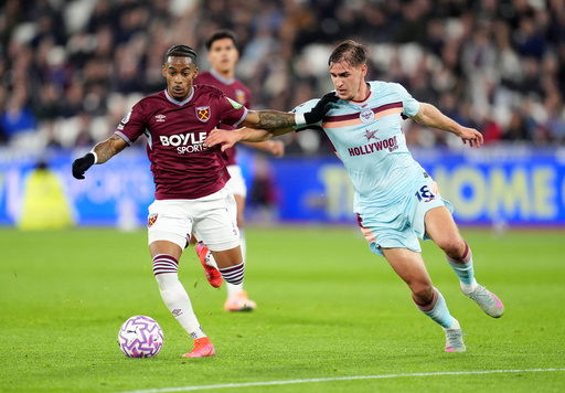 West Ham United's Crysencio Summerville, left, and Brentford's Yehor Yarmolyuk battle for the ball during the English Premier League soccer match between West Ham United and Brentford at the London Stadium, London, Monday Oct. 20, 2025. (Steven Paston/PA via AP) West Ham United's Crysencio Summerville, left, and Brentford's Yehor Yarmolyuk battle for the ball during the English Premier League soccer match between West Ham United and Brentford at the London Stadium, London, Monday Oct. 20, 2025. (Steven Paston/PA via AP)
