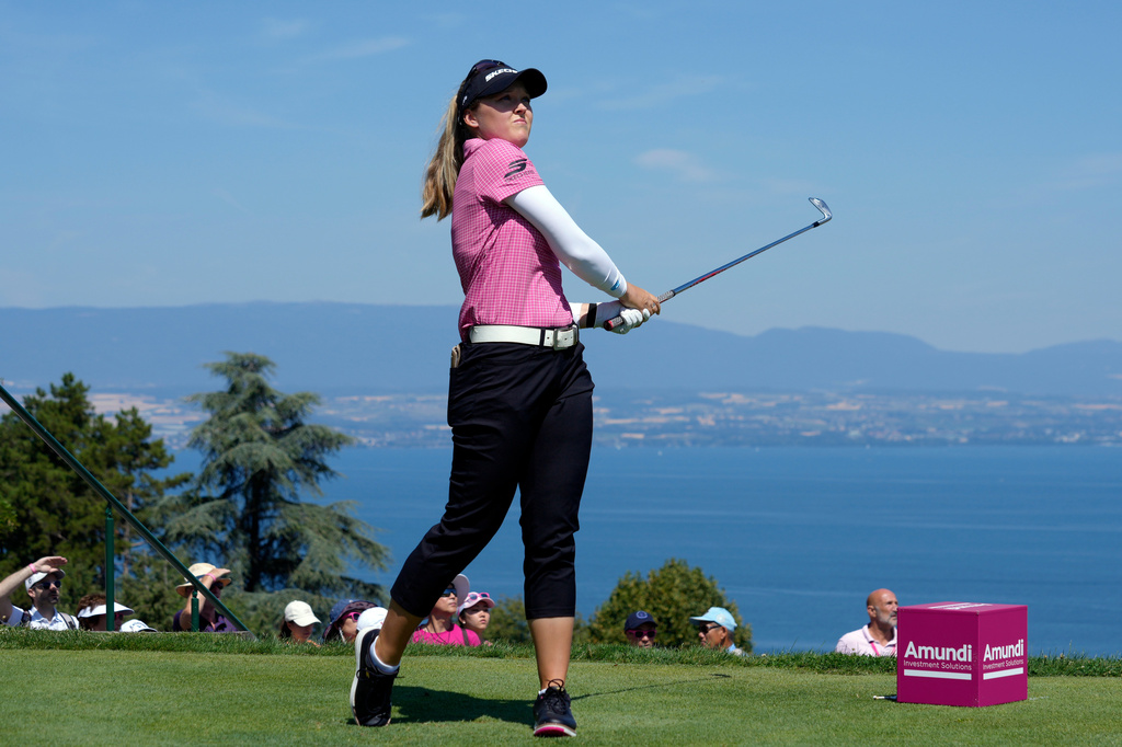 Brooke Henderson, of USA, plays on the 5th hole during the last round of the Evian Championship women's golf tournament, in Evian, eastern France, Sunday, July 12, 2026. (AP Photo/Laurent Cipriani)