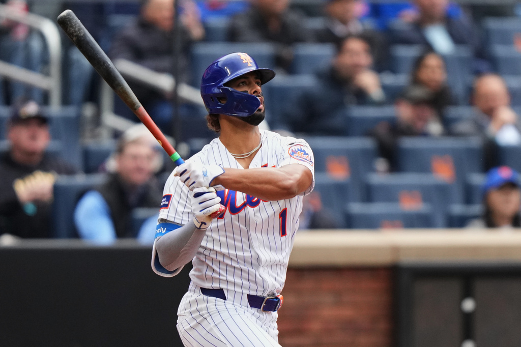 New York Mets' MJ Melendez (1) follows through on a three run home run during the third inning of a baseball game against the Washington Nationals Thursday, April 30, 2026, in New York. (AP Photo/Frank Franklin II)