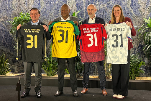 From left to right, Mexican Football Federation president Mikel Arriola, Jamaica Football Federation president Michael Ricketts, Costa Rican Football Federation president Osael Maroto Martínez and U.S. Soccer president Cindy Parlow Cone pose with jerseys at a news conference in New York, Monday, Oct. 20, 2025, to announce the four nations had joined a proposal to co-host the 2031 Women's World Cup, the only bid being considered by FIFA. (AP Photo/Ron Blum) From left to right, Mexican Football Federation president Mikel Arriola, Jamaica Football Federation president Michael Ricketts, Costa Rican Football Federation president Osael Maroto Martínez and U.S. Soccer president Cindy Parlow Cone pose with jerseys at a news conference in New York, Monday, Oct. 20, 2025, to announce the four nations had joined a proposal to co-host the 2031 Women's World Cup, the only bid being considered by FIFA. (AP Photo/Ron Blum)