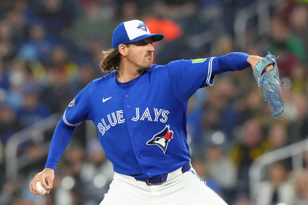 Toronto Blue Jays pitcher Kevin Gausman (34) works against the Cleveland Guardians during the first inning of a baseball game in Toronto, Saturday, April 25, 2026. (Chris Young/The Canadian Press via AP)