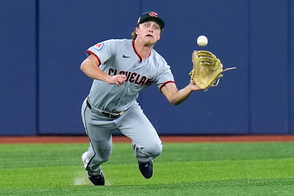 Cleveland Guardians center fielder Petey Halpin makes the catch on a fly out by Tampa Bay Rays' Chandler Simpson during the eighth inning of a baseball game Friday, July 24, 2026, in St. Petersburg, Fla. (AP Photo/Chris O'Meara)