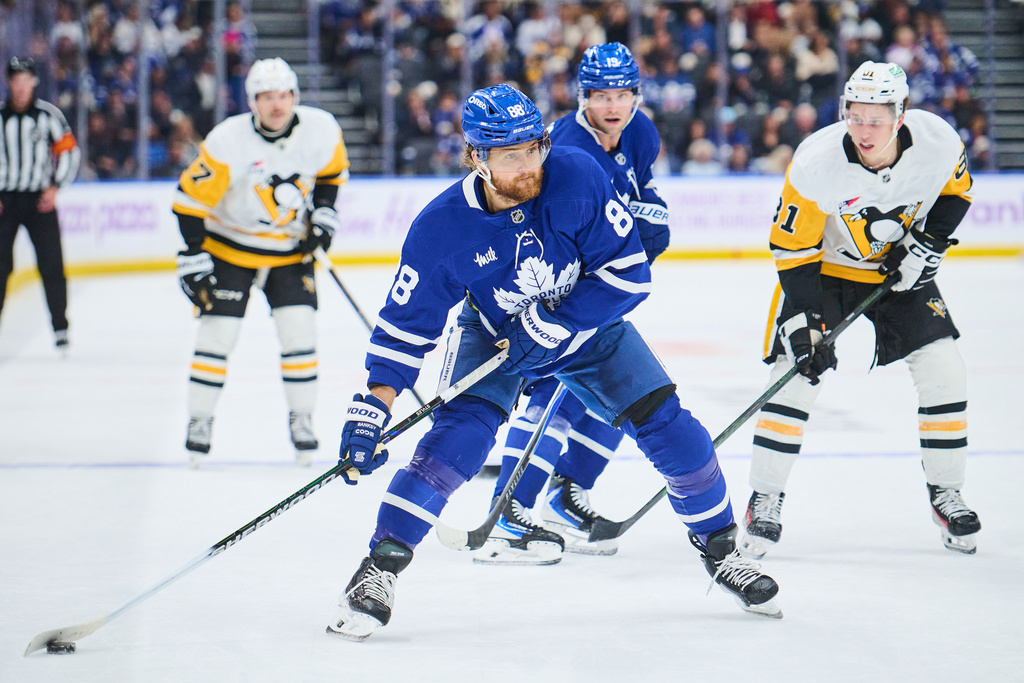 Toronto Maple Leafs' William Nylander (88) lines up a shot on goal during second period NHL hockey action against the Pittsburgh Penguins in Toronto, on Monday, Nov. 3, 2025. (Sammy Kogan/The Canadian Press via AP)