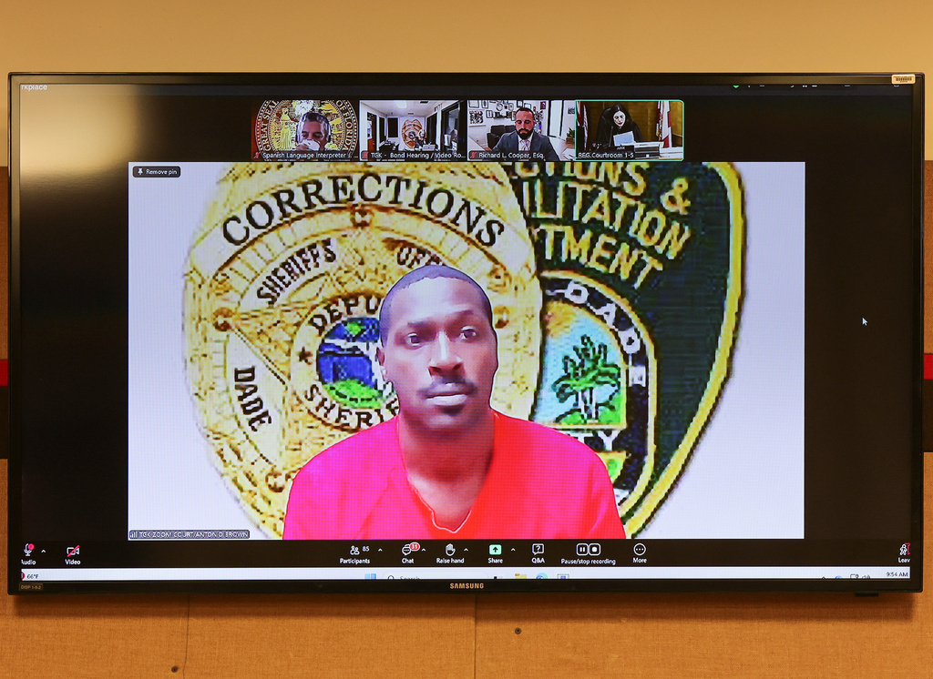 Former NFL star wide receiver Antonio Brown, displayed on a monitor, appears for his bond hearing via video, Wednesday, Nov. 12, 2025, in Miami. (Carl Juste/Miami Herald via AP, Pool)